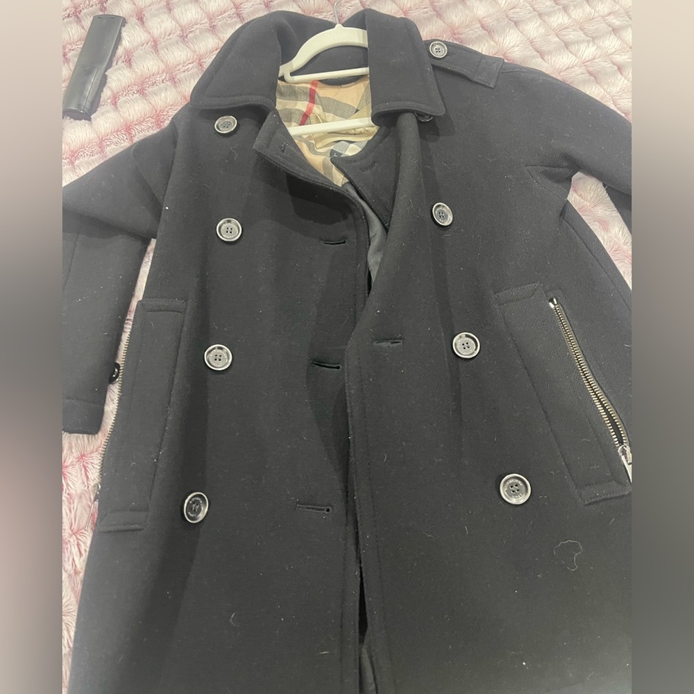 Like new Burberry Wool Jacket It’s navy blue. Haven’t used it in a while.